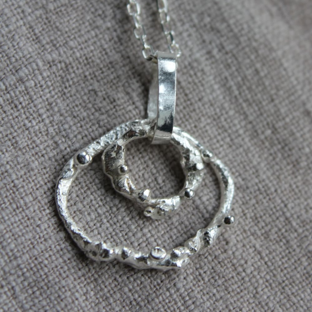 Double hoop reticulated sterling silver barnacle pendant necklace