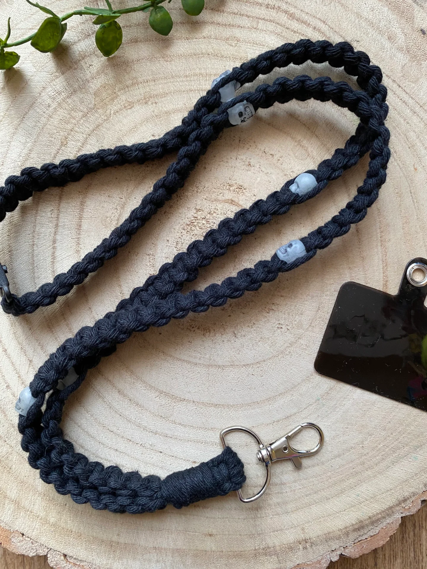 34' lanyard phone holder made with black recycled cotton.