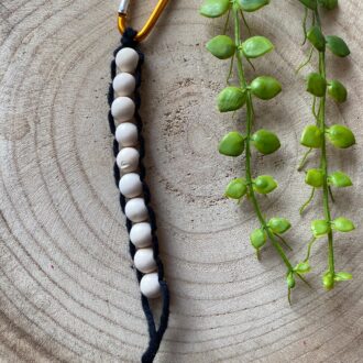 Golf Stroke counter made with recycled cotton, and wooden beads on a carabiner clip