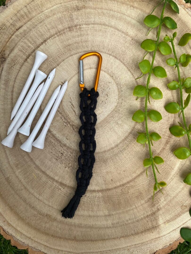 Golf tee holder, handmade with recycled yarn on a carabiner clip