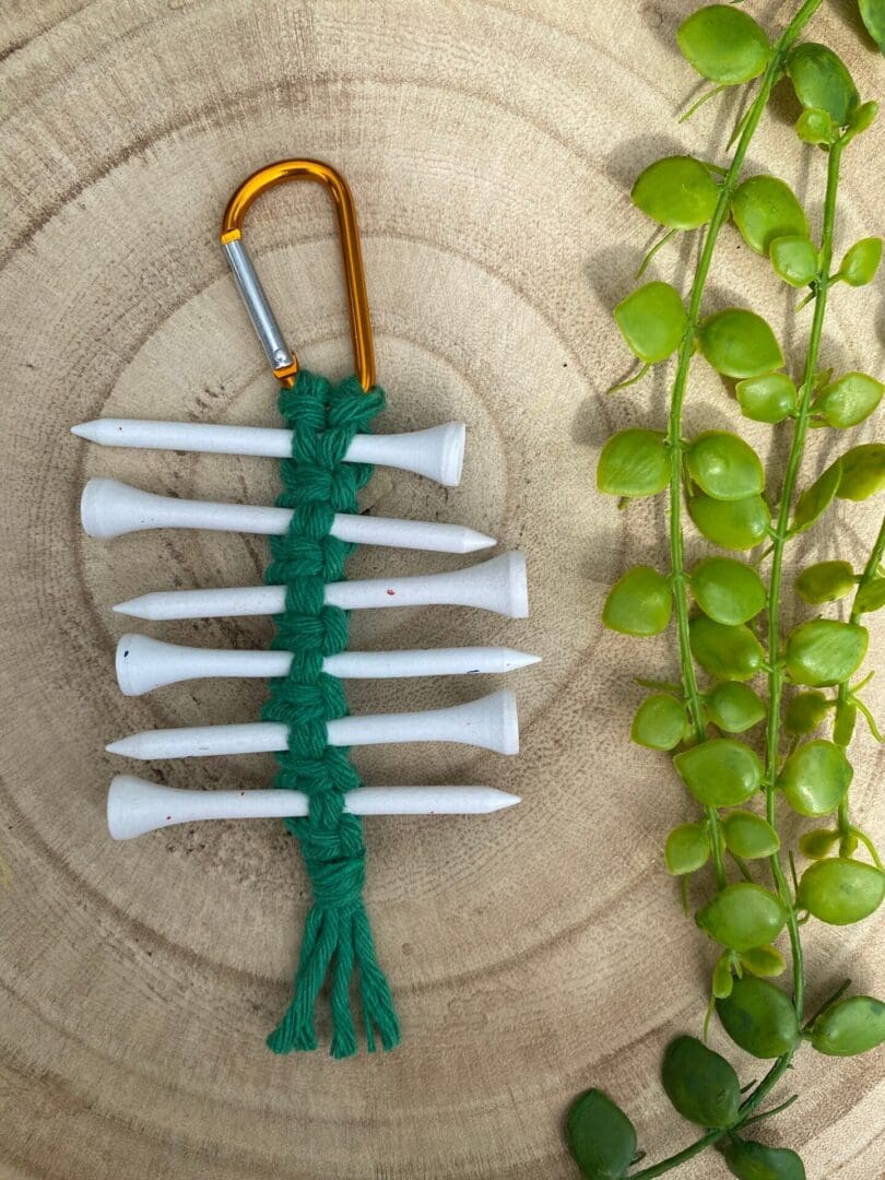 Golf tee holder, handmade with recycled yarn on a carabiner clip