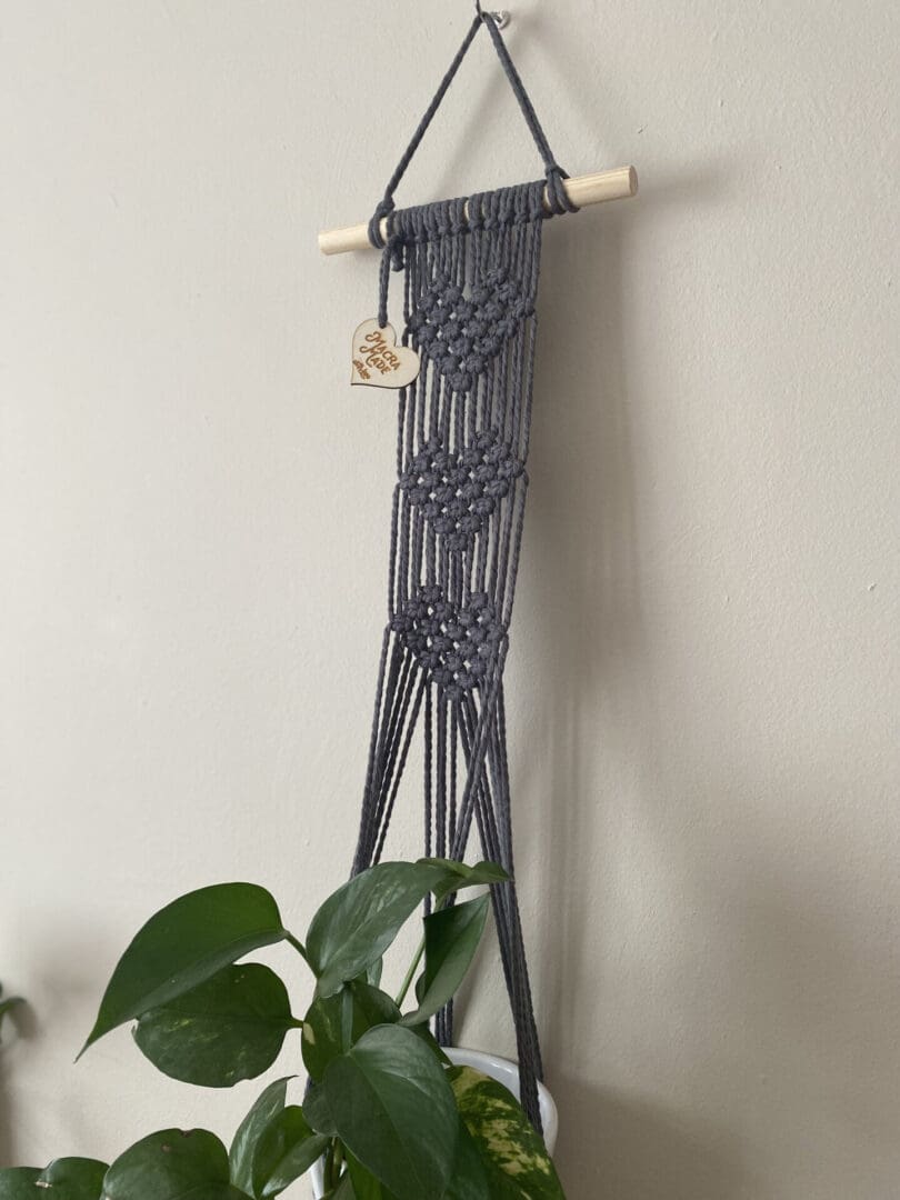 Wall hanging plant holder made with grey recycled cotton