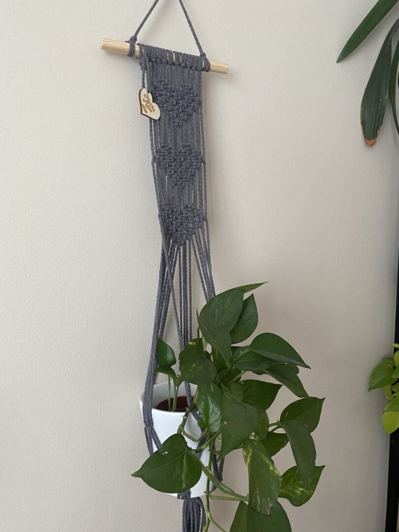 Wall hanging plant holder made with grey recycled cotton