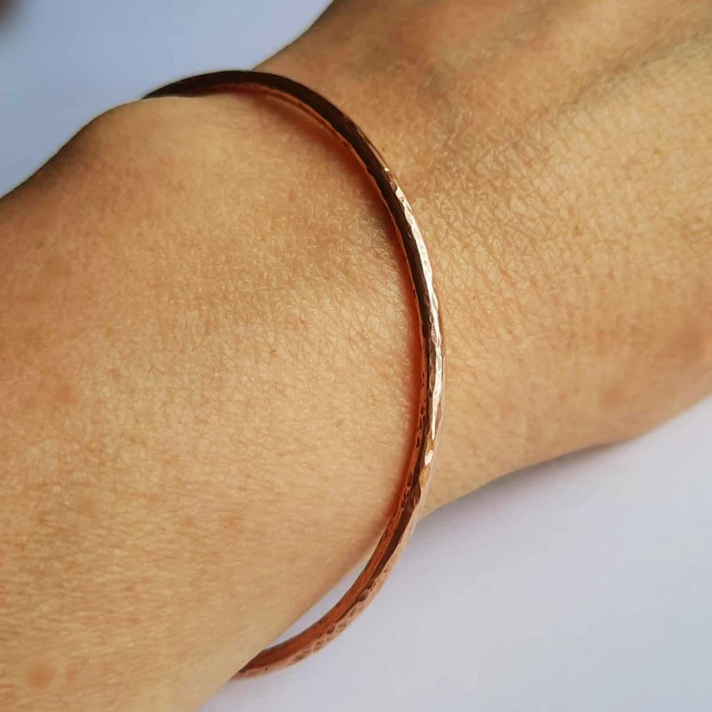 Chunky, hammer textured pure copper bangle bracelet, hand made by The Tiny Tree Frog Jewellery