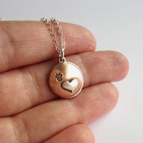 Heart and cat or dog paw print copper and sterling silver necklace, hand crafted by The Tiny Tree Frog Jewellery