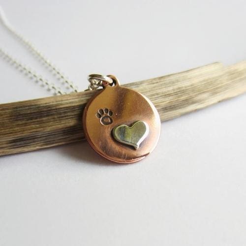 Pawprint and heart copper and sterling silver necklace gift for dog lover, artisan made by The Tiny Tree Frog Jewellery