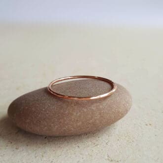 Dainty hammer textured copper ring for finger or thumb, handcrafted by The Tiny Tree Frog Jewellery