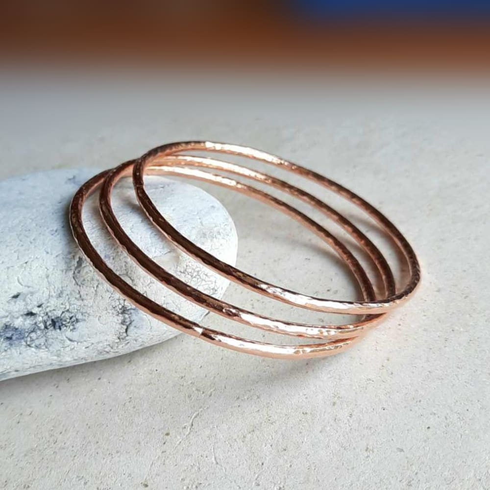 Set of 3 hammered copper bangles, handmade by The Tiny Tree Frog Jewellery