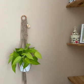 Macrame Plant Hanger made with taupe recycled cotton yarn.