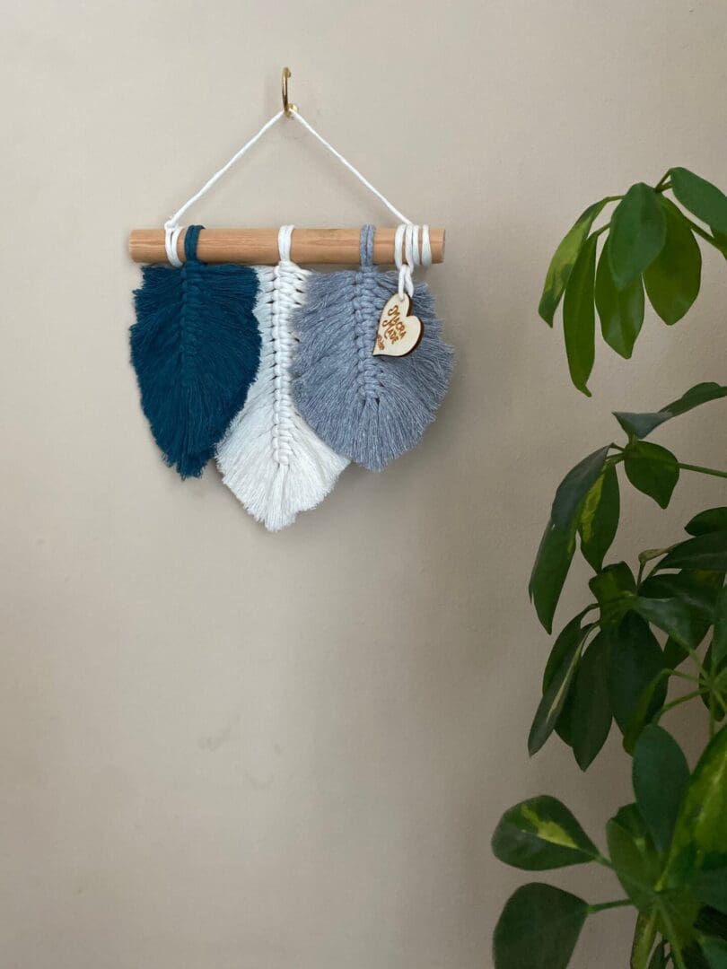 Macrame leaf wall hanging decor made using recycled cotton yarns