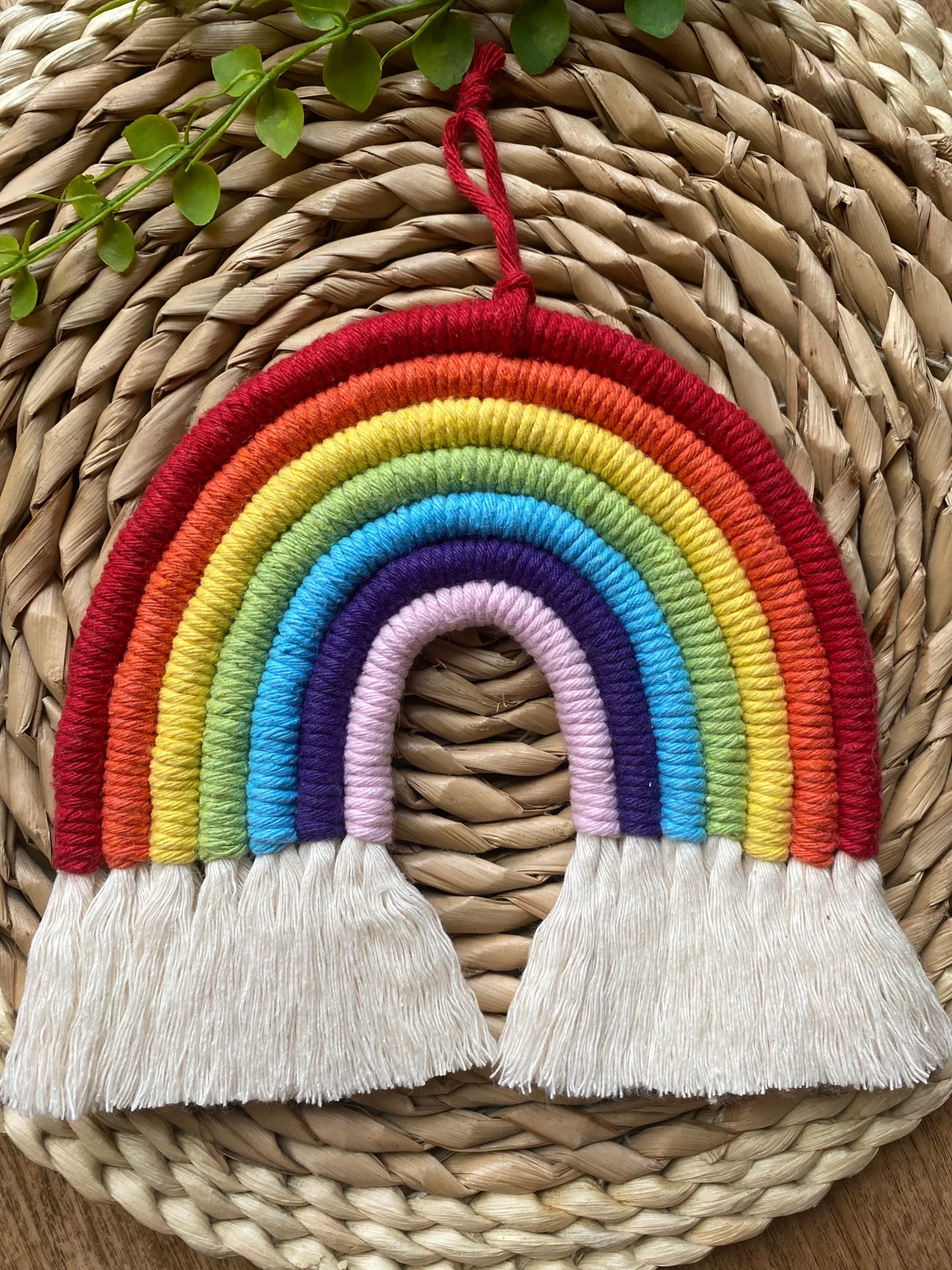 Macrame rainbow wall hanging decoration, made with 7 vibrant colours of recycled cotton