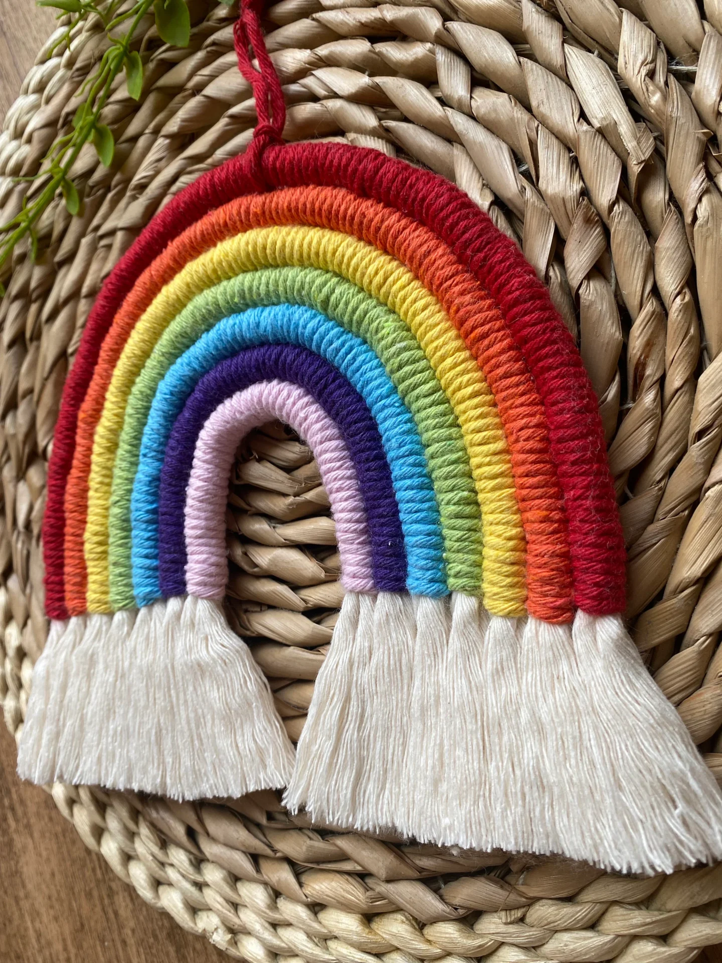 Macrame rainbow wall hanging decoration, made with 7 vibrant colours of recycled cotton