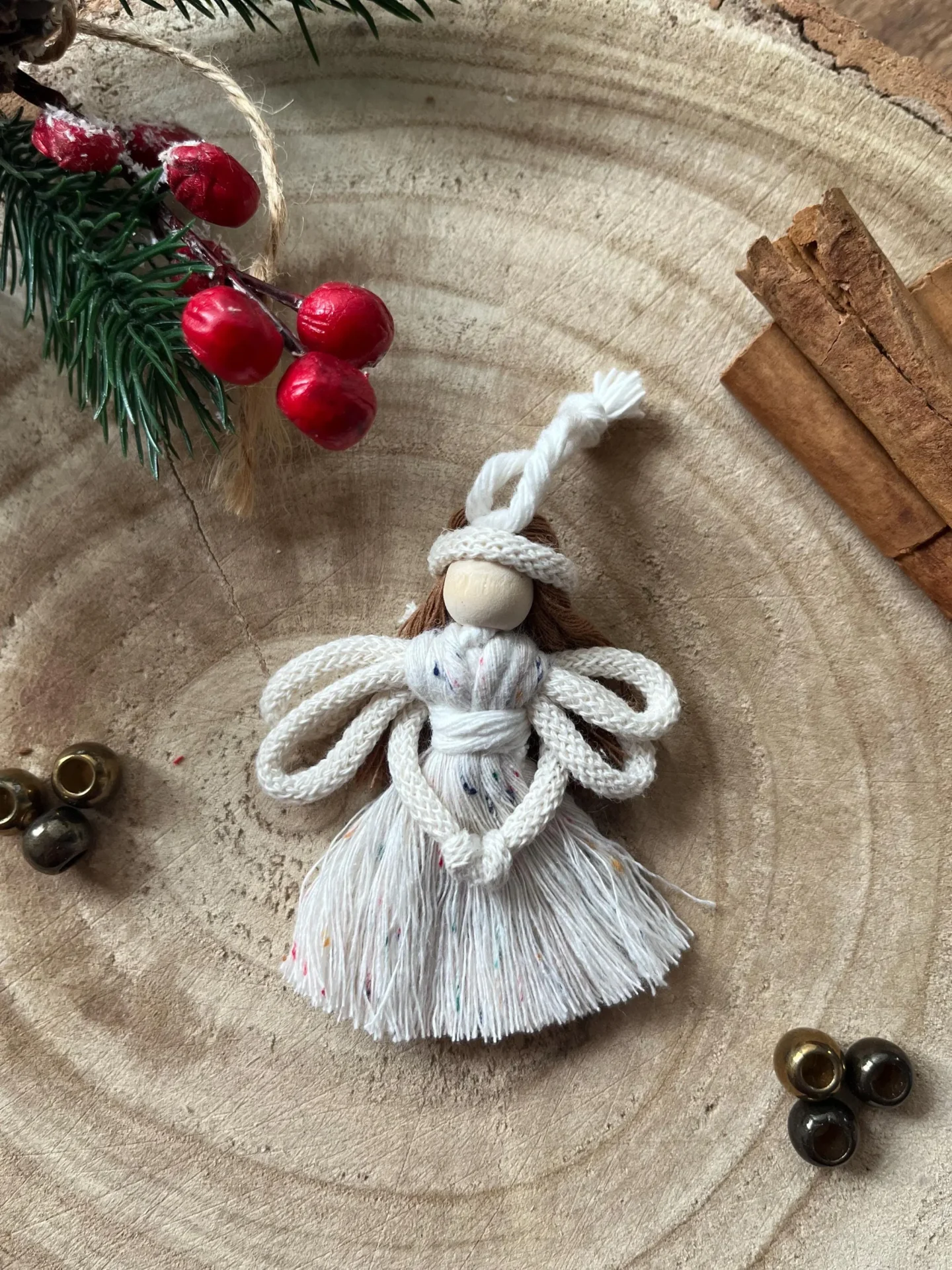 Miniature macrame fairy hanging decoration made with recycled cotton