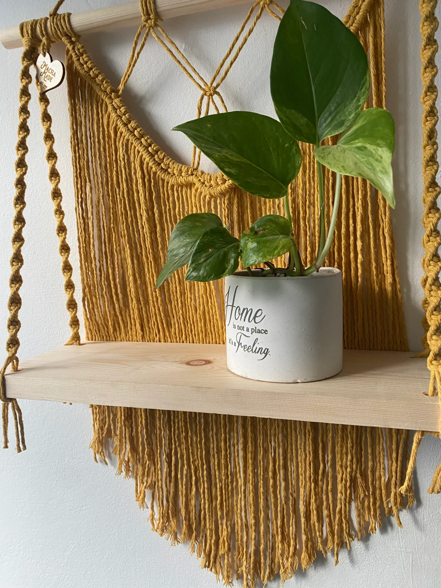 Macrame wall hanging shelf made with mustard yellow recycled cotton