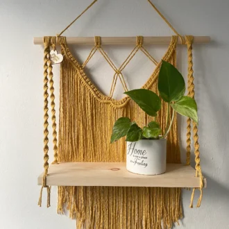 Macrame wall hanging shelf made with mustard yellow recycled cotton