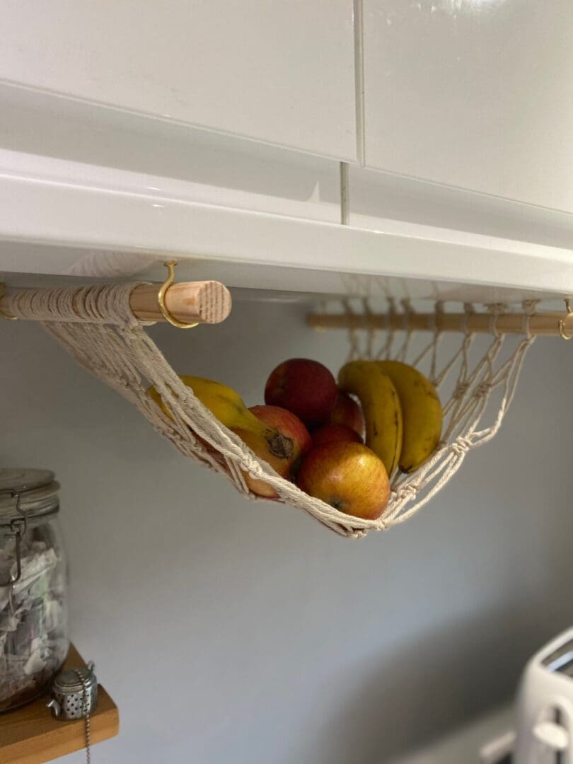 Under cabinet space saving fruit hammock made with natural recycled cotton