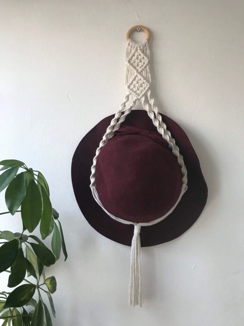 Macrame wall hanging hat holder, made with recycled cotton