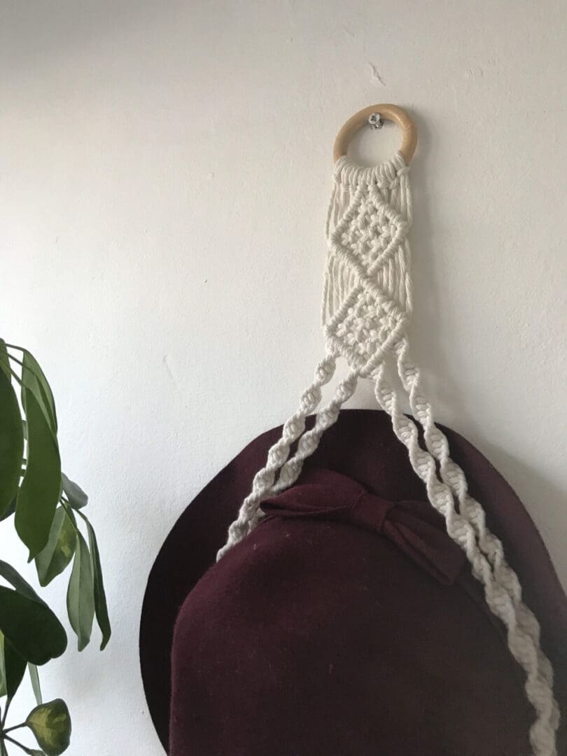 Macrame wall hanging hat holder, made with recycled cotton