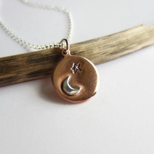 Oxidised hand stamped star and crescent moon copper and sterling silver pendant necklace, hand made by The Tiny Tree Frog Jewellery