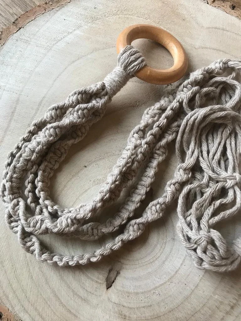 Macrame Plant Hanger made with recycled cotton and a repurposed wooden hanging ring