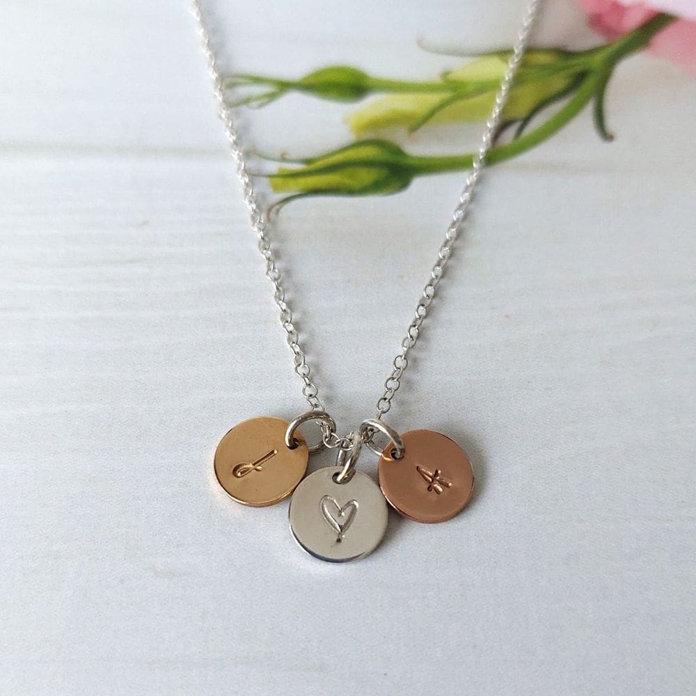 hand-stamped initial disc silver necklace with 3 different metal discs - silver, gold-filled & rose-gold filled