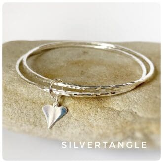 Two Silver Bangles with a Solid Silver Heart Charm