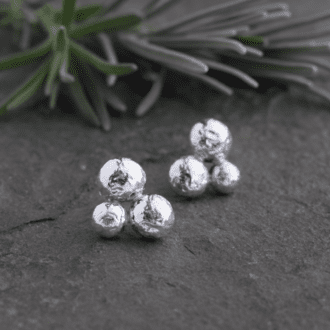 silver earrings with three sterling silver pebbles clustered together