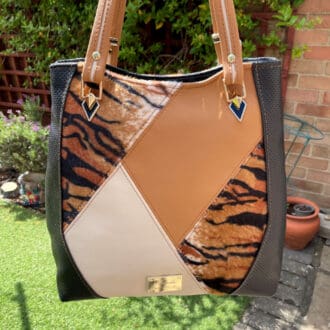 Statement larger handbag for ladies tan shades and velboa tiger design