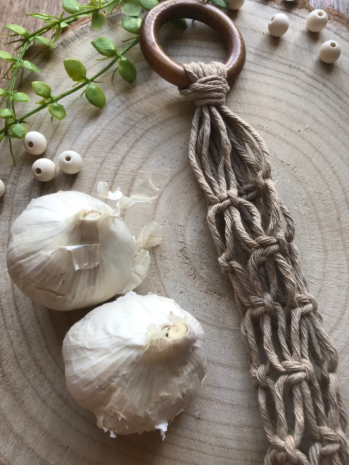 Hanging garlic storage, made with taupe recycled cotton