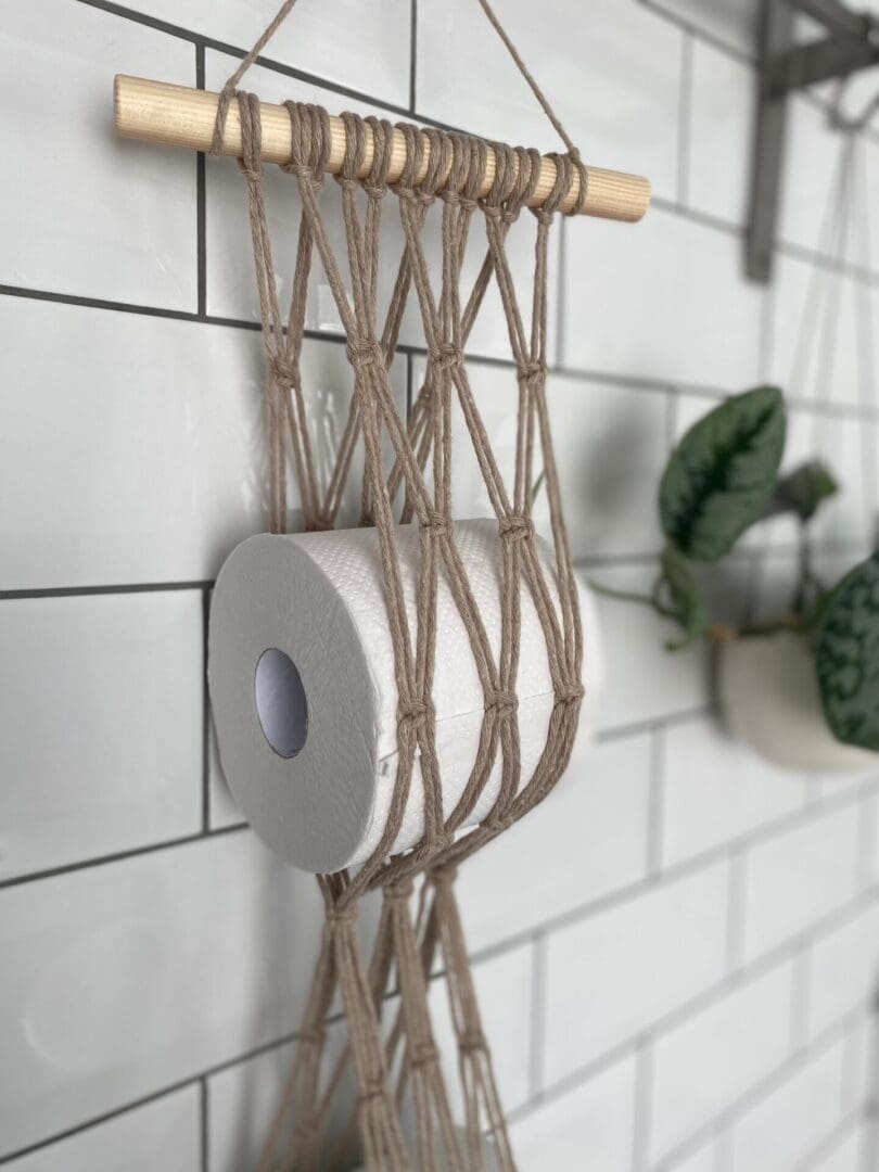 Toilet roll holder, wall hanging bathroom storage made with recycled cotton.