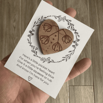 Wooden floral engraved pocket heart attached to a sentimental poem gift card