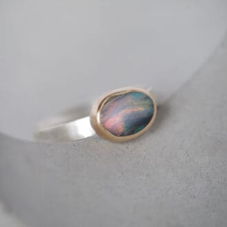 Australian boulder opal ring with 9ct yellow gold bezel and sterling silver