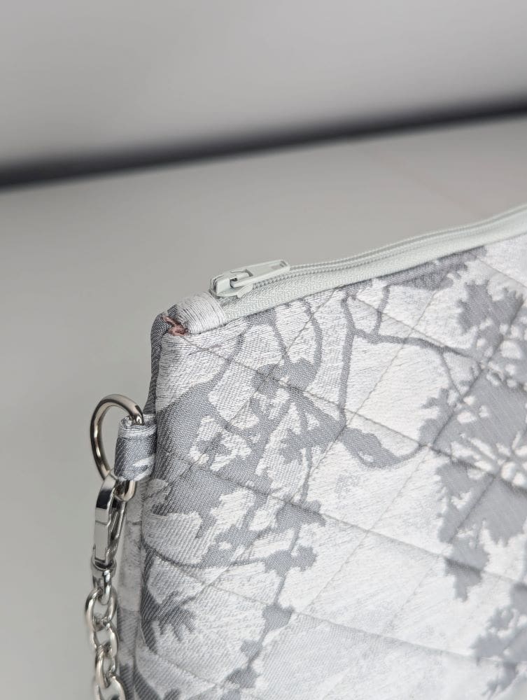 Floral-patterned silver clutch bag for formal occasions