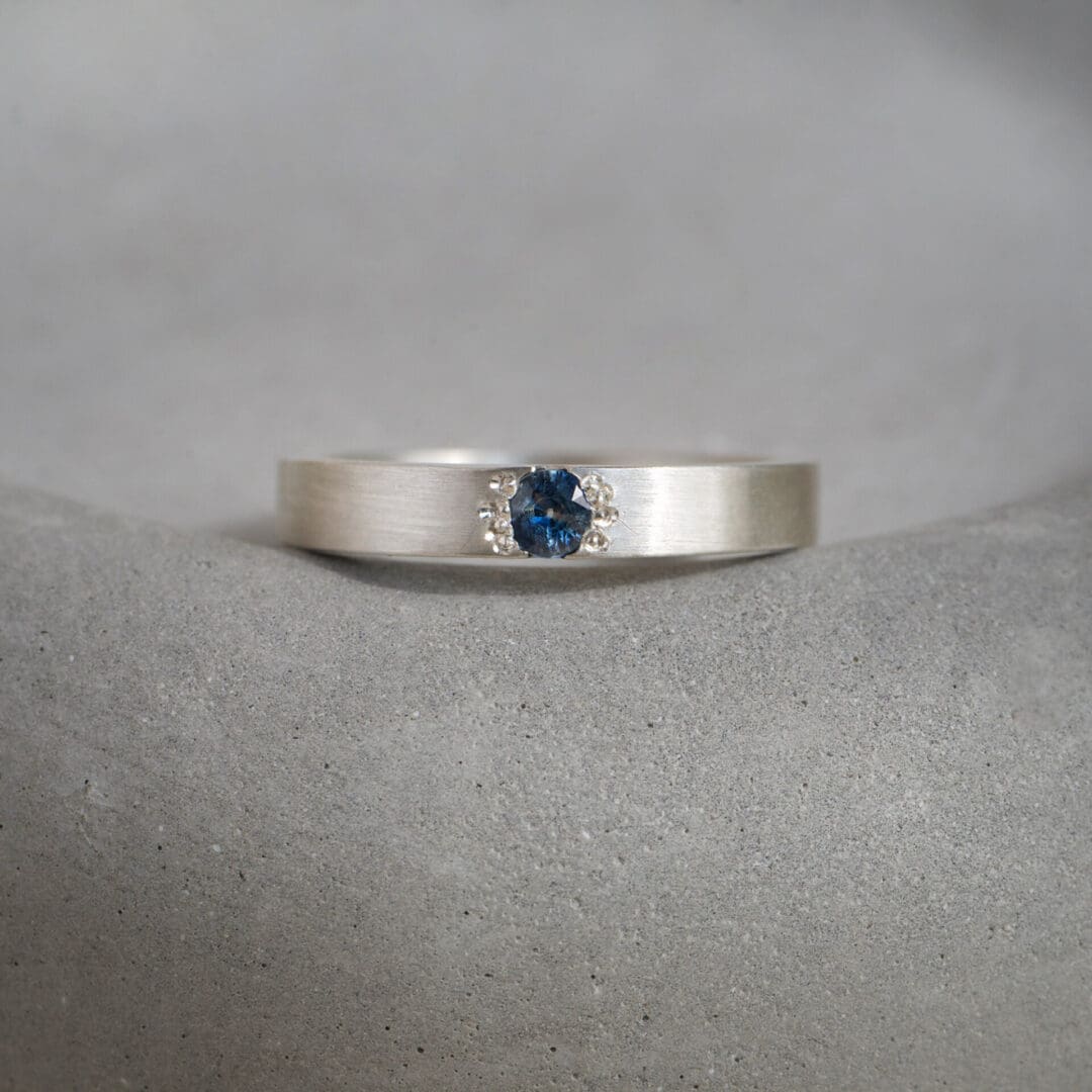 Cornflower blue sapphire star set argentium ring