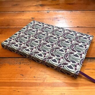 A5 plain paper handmade notebook covered in Liberty fabric Mauverina