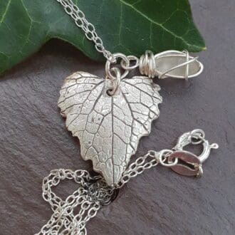 heart shaped silver lead and white wire wrapped sea glass necklace