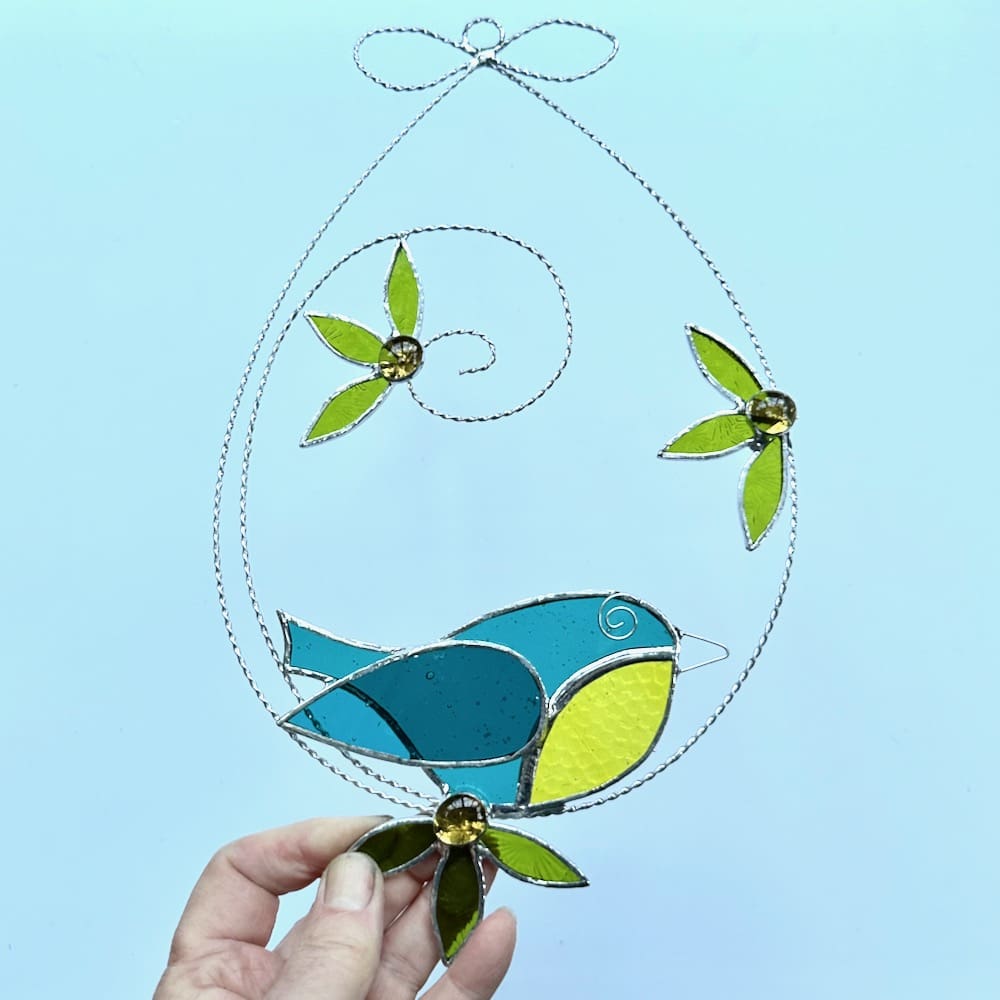 Stained glass blue tit and flower suncatcher