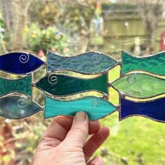 Shoal of 9 fish suncatcher