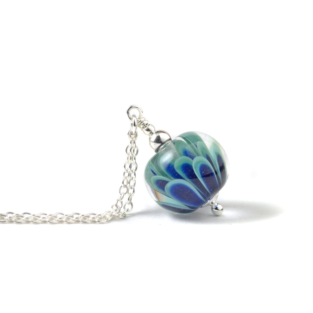 Small lampwork glass flower necklace in teal