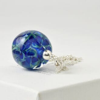 Deep blue green long lampwork glass floral pendant necklace