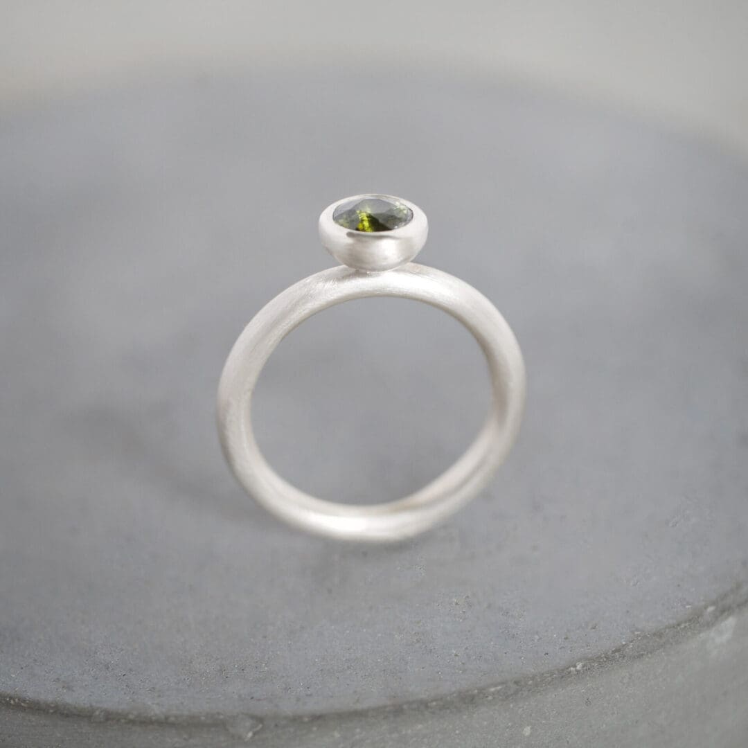 Olive green natural zircon and sterling silver ring