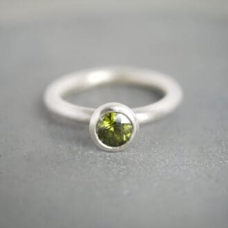 Olive green natural zircon and sterling silver ring