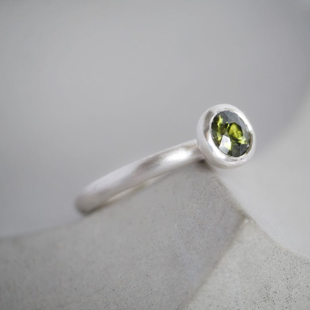 Olive green natural zircon and sterling silver ring