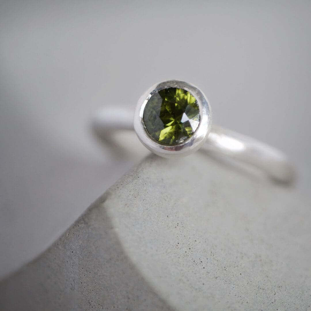 Olive green natural zircon and sterling silver ring