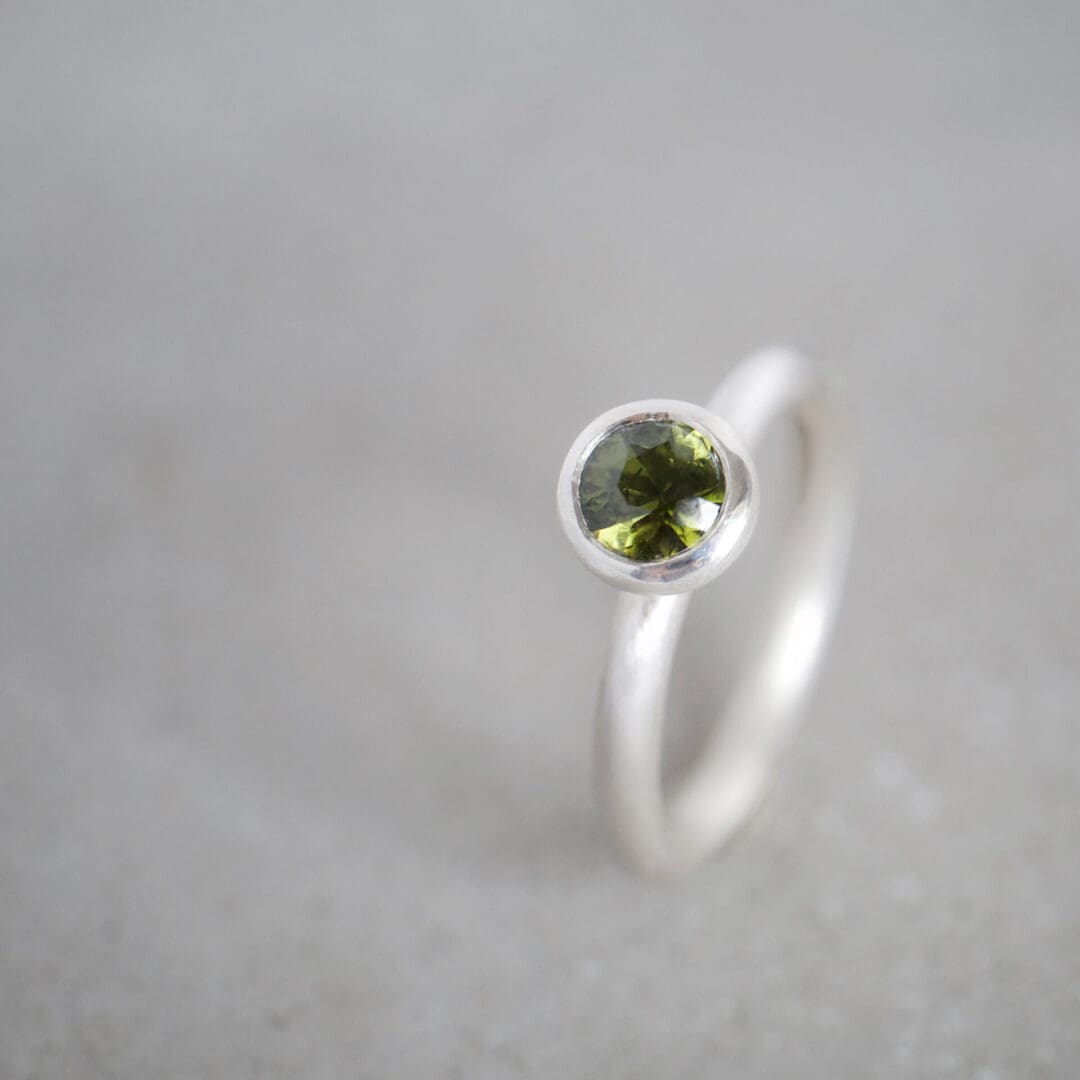 Olive green natural zircon and sterling silver ring