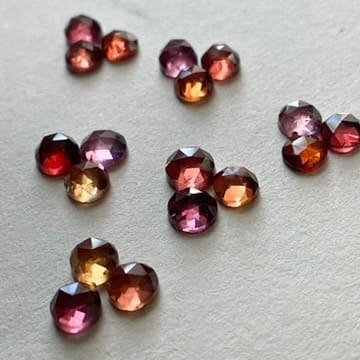 Ombre garnet rose cut gemstones in warm tones