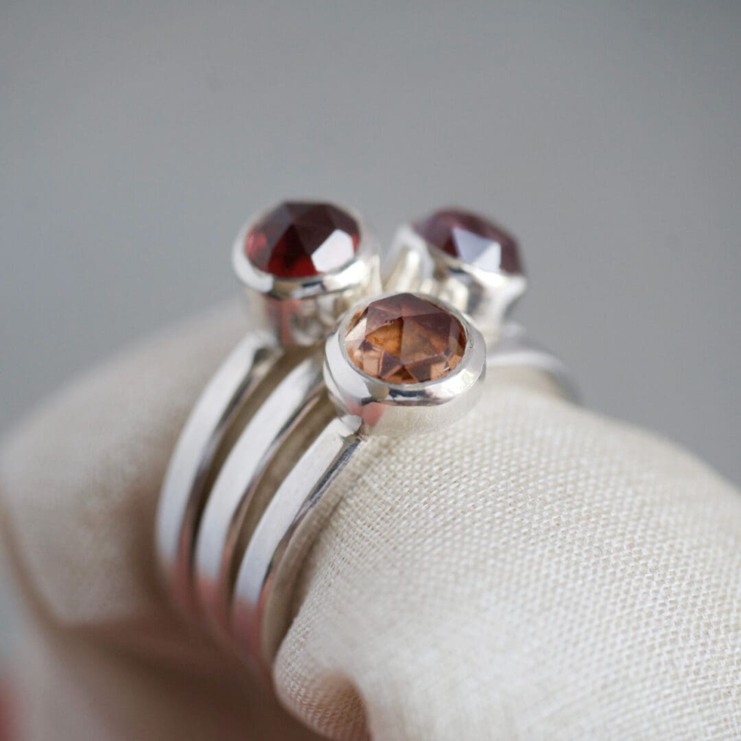 Ombre garnet stacking rings set in sterling silver