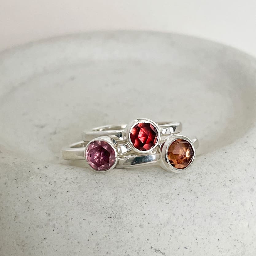 Ombre garnet stacking rings set in sterling silver