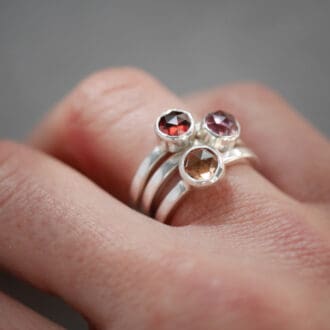 Ombre garnet stacking rings set in sterling silver