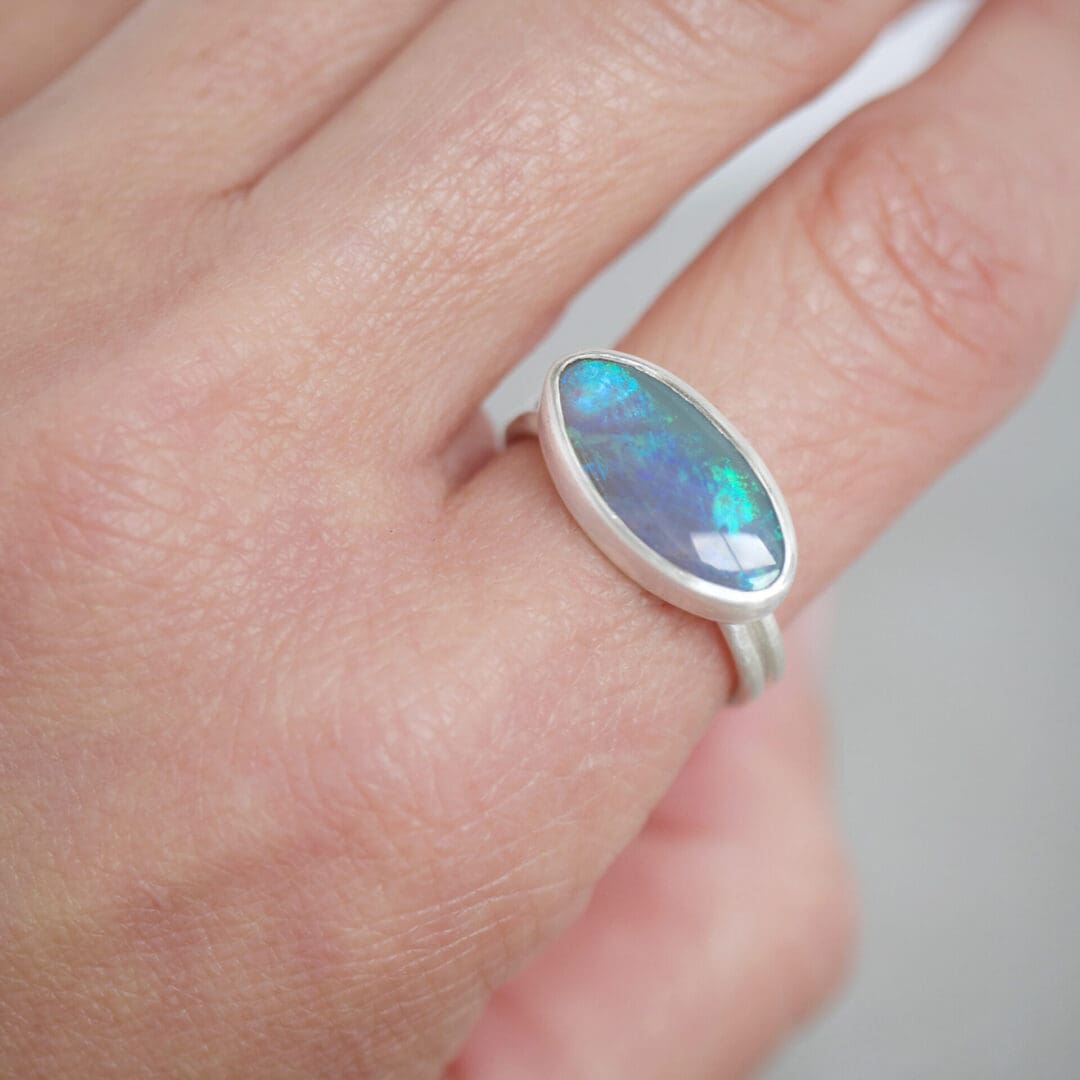 Lightning Ridge Oval Opal dual ring in Argentium Silver, worn